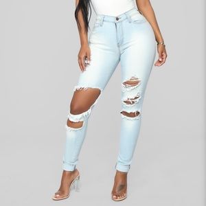 Light blue ripped jeans